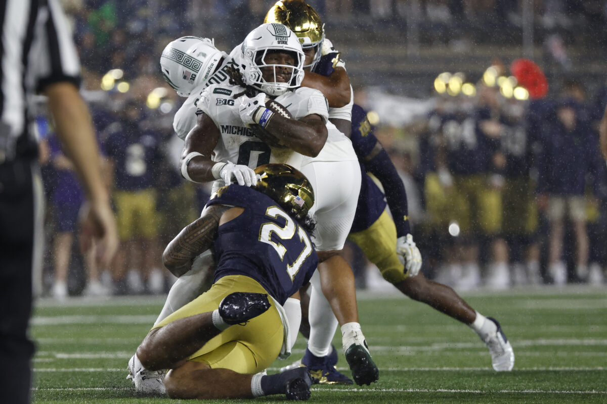 Sep 19, 2026; South Bend, Indiana, USA; Notre Dame Fighting Irish linebacker Kyngstonn Viliamu-Asa (27) tackles Michigan State Spartans running back Cam Edwards (0) during the first half at Notre Dame Stadium. Mandatory Credit: Michael Caterina-Imagn Images