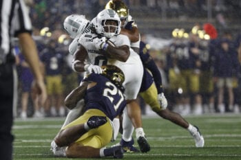 Sep 19, 2026; South Bend, Indiana, USA;  Notre Dame Fighting Irish linebacker Kyngstonn Viliamu-Asa (27) tackles Michigan State Spartans running back Cam Edwards (0) during the first half at Notre Dame Stadium.  Mandatory Credit: Michael Caterina-Imagn Images