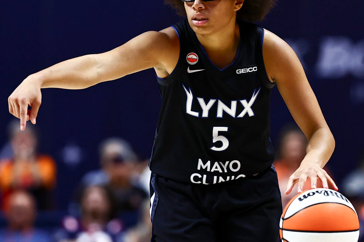 Sep 20, 2026; Uncasville, Connecticut, USA;  Minnesota Lynx guard Olivia Miles (5) dribbles the ball against Connecticut Sun in the second half at Mohegan Sun Arena.  Mandatory Credit: John Dufour-Imagn Images