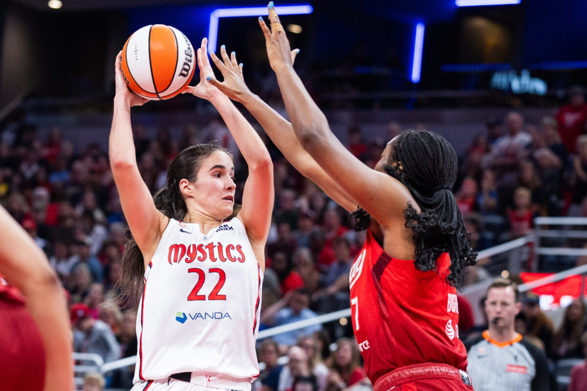Sep 20, 2026; Indianapolis, Indiana, USA;  Washington Mystics guard Sonia Citron (22) shoots the ball while Indiana Fever guard Raven Johnson (3) defends in the second half at Gainbridge Fieldhouse.  Mandatory Credit: Trevor Ruszkowski-Imagn Images
