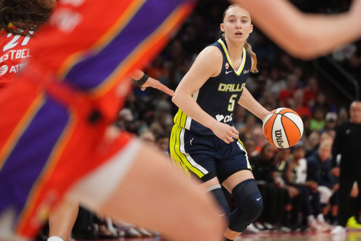 Dallas Wings guard Paige Bueckers (5) looks to pass the ball against the Phoenix Mercury at Mortgage Matchup Center in Phoenix on Sept. 21, 2026.