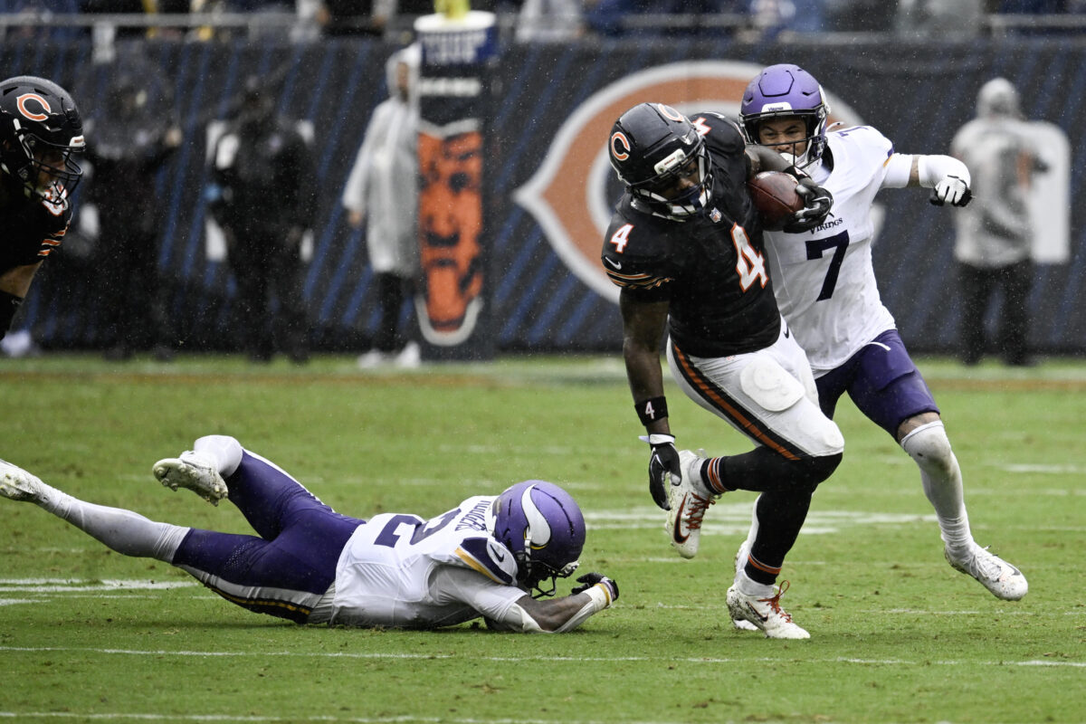 Sep 20, 2026; Chicago, Illinois, USA; Chicago Bears running back D'Andre Swift (4) runs against Minnesota Vikings cornerback Byron Murphy Jr. (7) during the second half at Soldier Field. Mandatory Credit: Matt Marton-Imagn Images
