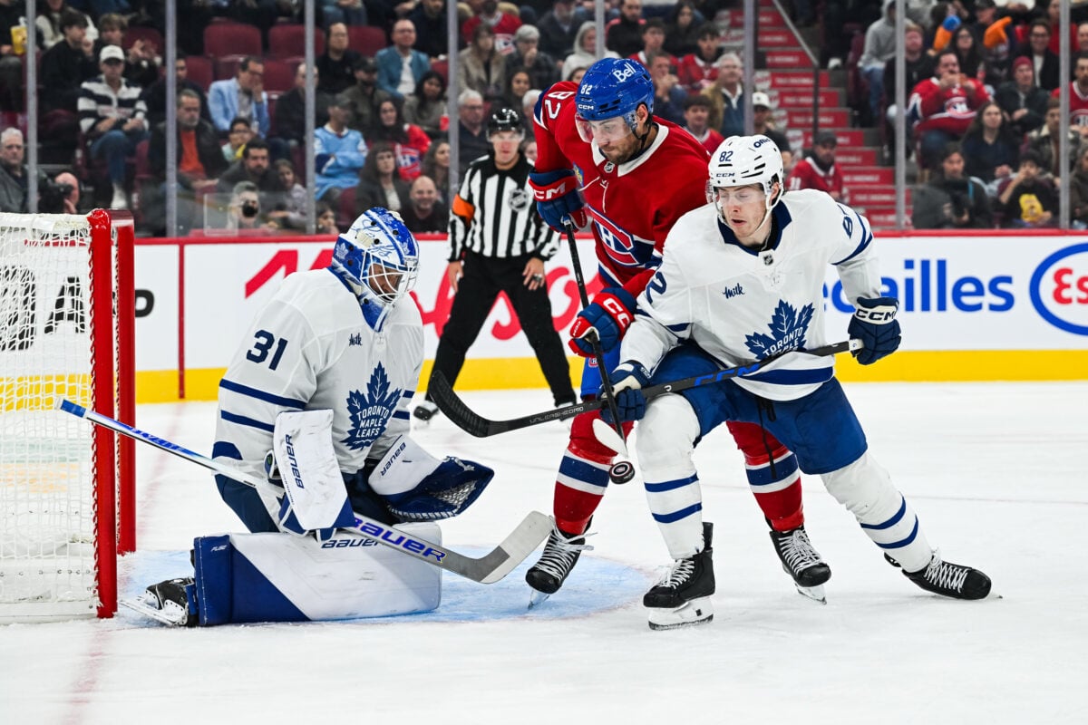 Sep 19, 2026; Montreal, Quebec, CAN; Toronto Maple Leafs defenseman Cole McWard (82) defends as goalie Samuel Hlavaj (31) makes a save against Montreal Canadiens left wing Lucas Condotta (82) during the second period at Bell Centre. Mandatory Credit: David Kirouac-Imagn Images