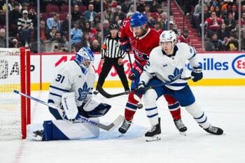 Sep 19, 2026; Montreal, Quebec, CAN; Toronto Maple Leafs defenseman Cole McWard (82) defends as goalie Samuel Hlavaj (31) makes a save against Montreal Canadiens left wing Lucas Condotta (82) during the second period at Bell Centre. Mandatory Credit: David Kirouac-Imagn Images