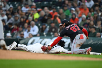 Sep 22, 2026; Detroit, Michigan, USA;  Detroit Tigers center fielder Max Clark (15) gets tagged out on a pick off play at first base by Washington Nationals first baseman Andres Chaparro (87)  in the second inning at Comerica Park.  Mandatory Credit: Lon Horwedel-Imagn Images