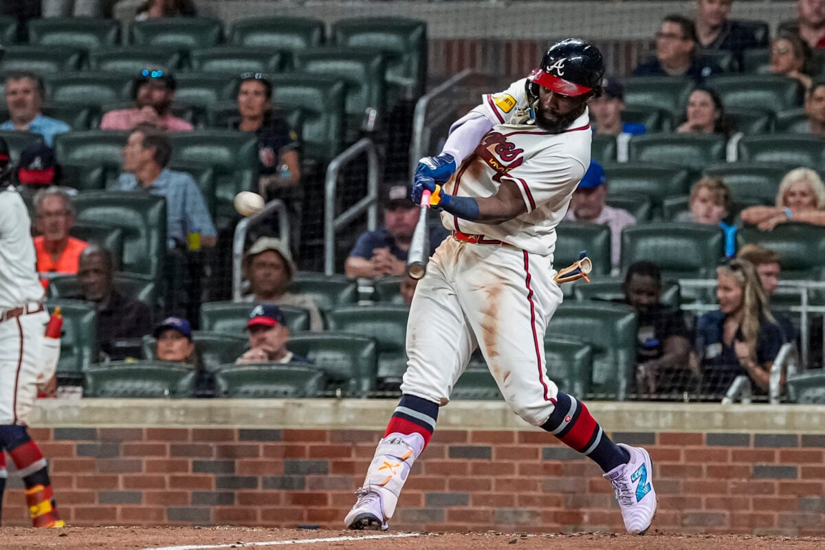 Sep 22, 2026; Cumberland, Georgia, USA; Atlanta Braves center fielder Michael Harris II (23) hits a double against the Cincinnati Reds during the ninth inning at Truist Park. Mandatory Credit: Dale Zanine-Imagn Images
