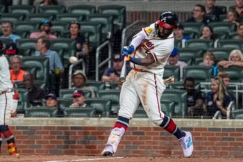 Sep 22, 2026; Cumberland, Georgia, USA; Atlanta Braves center fielder Michael Harris II (23) hits a double against the Cincinnati Reds during the ninth inning at Truist Park. Mandatory Credit: Dale Zanine-Imagn Images