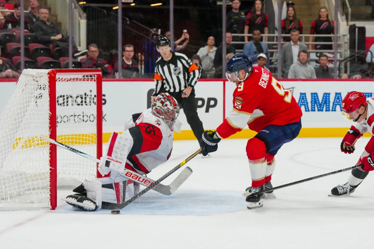 Sep 22, 2026; Raleigh, North Carolina, USA;  Carolina Hurricanes goalie Cayden Primeau (55) stops the overtime shot by Florida Panthers center Sam Bennett (9) during the overtime at Lenovo Center.  Mandatory Credit: James Guillory-Imagn Images