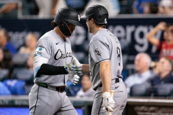 Sep 22, 2026; Kansas City, Missouri, USA;  Chicago White Sox first baseman Munetaka Murakami (5) slaps hands with Chicago White Sox catcher Kyle Teel (8) after hitting a home run during the sixth inning against the Kansas City Royals at Kauffman Stadium.  Mandatory Credit: William Purnell-Imagn Images