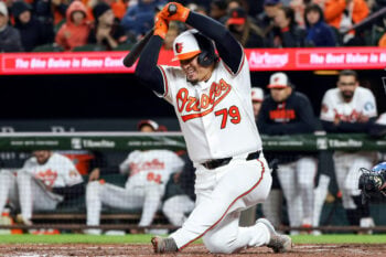 Sep 23, 2026; Baltimore, Maryland, USA;  Baltimore Orioles catcher Yohel Pozo (79) falls while swinging at a pitch during the eighth inning in Game 2 of a doubleheader against the Toronto Blue Jays at Oriole Park at Camden Yards.  Mandatory Credit: Daniel Kucin Jr.-Imagn Images