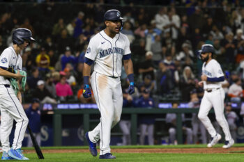 Sep 23, 2026; Seattle, Washington, USA; Seattle Mariners center fielder Julio Rodríguez (44) reacts after drawing an RBI-walk against the Houston Astros during the tenth inning at T-Mobile Park. Mandatory Credit: Joe Nicholson-Imagn Images