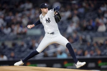 Sep 24, 2026; Bronx, New York, USA; New York Yankees starting pitcher Cam Schlittler (31) pitches against the Tampa Bay Rays during the first inning at Yankee Stadium. Mandatory Credit: Brad Penner-Imagn Images