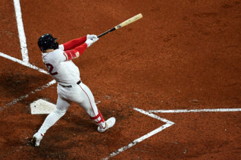 Sep 25, 2026; Boston, Massachusetts, USA;  Boston Red Sox designated hitter Wilyer Abreu (52) hits an RBI double during the eighth inning against the Chicago Cubs at Fenway Park. Mandatory Credit: Bob DeChiara-Imagn Images