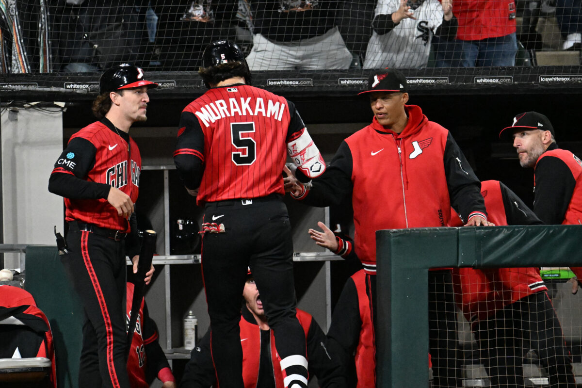 Sep 25, 2026; Chicago, Illinois, USA;  Chicago White Sox first baseman Munetaka Murakami (5) high fives manager Will Venable (1), right, after he hit a home run during the seventh inning against the Colorado Rockies at Rate Field.  Mandatory Credit: Matt Marton-Imagn Images