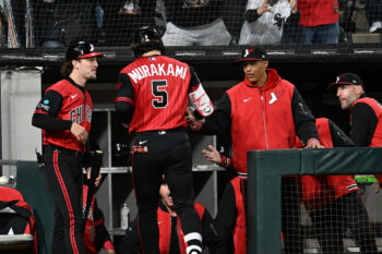 Sep 25, 2026; Chicago, Illinois, USA;  Chicago White Sox first baseman Munetaka Murakami (5) high fives manager Will Venable (1), right, after he hit a home run during the seventh inning against the Colorado Rockies at Rate Field.  Mandatory Credit: Matt Marton-Imagn Images