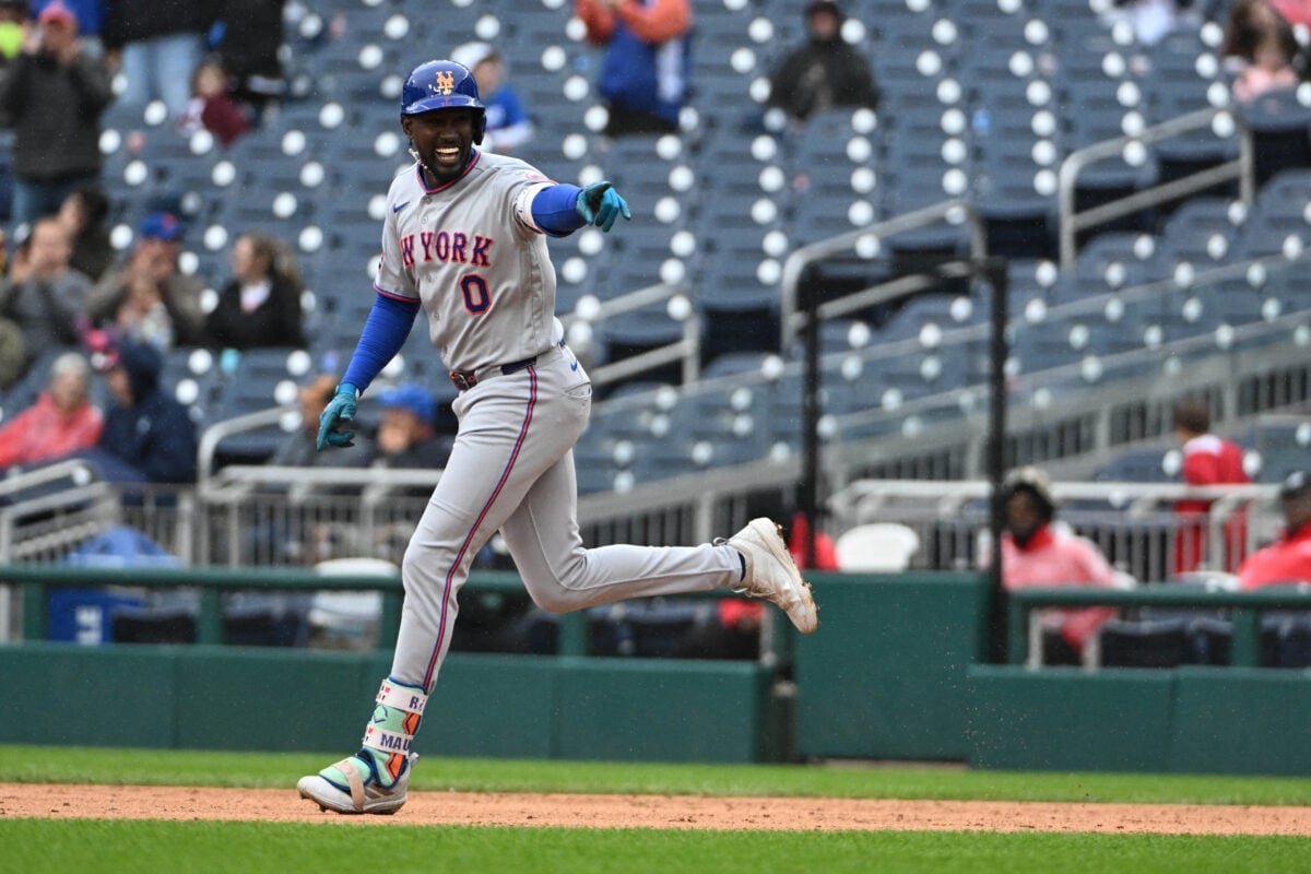 Sep 26, 2026; Washington, District of Columbia, USA; New York Mets shortstop Ronny Mauricio (0) reacts after hitting a solo home run against the Washington Nationals during the ninth inning at Nationals Park. Mandatory Credit: Brad Mills-Imagn Images
