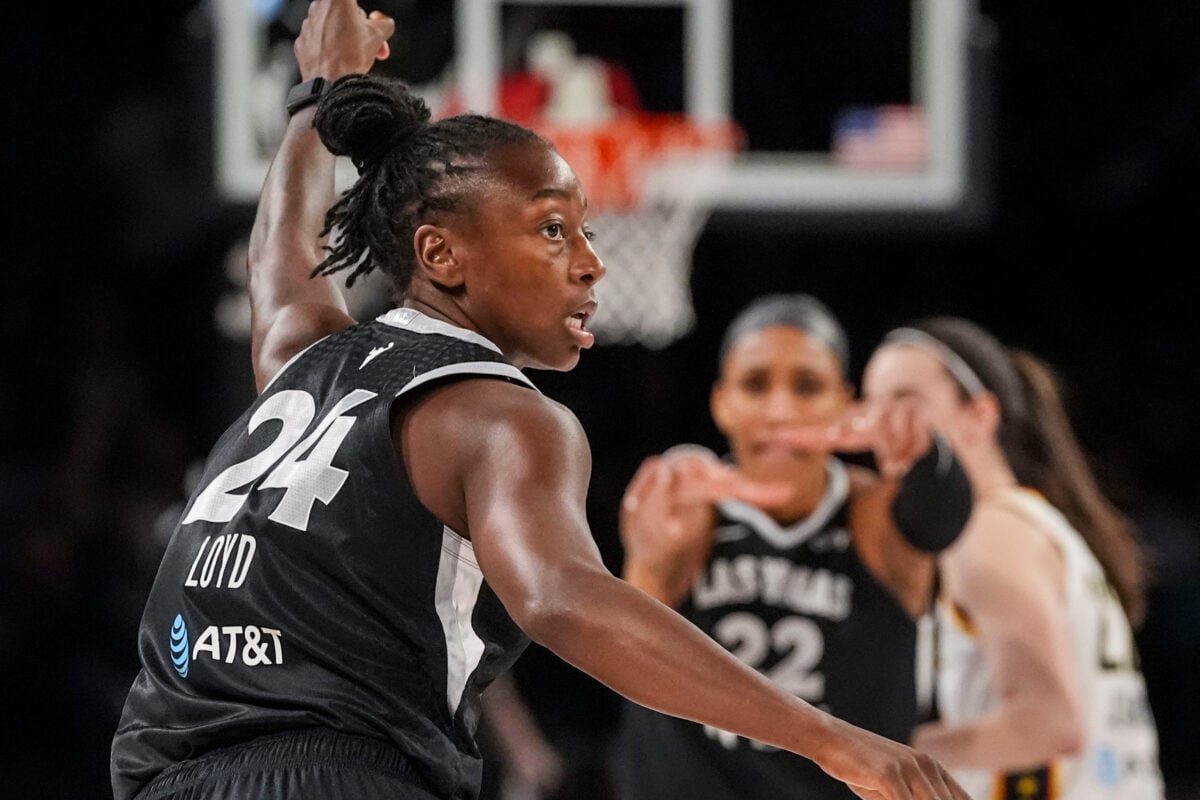 Las Vegas Aces guard Jewell Loyd (24) points after scoring Sunday, Sept. 27, 2026, during the first half of Game 1 of the first round of the WNBA Playoffs at Michelob ULTRA Arena in Las Vegas. The Las Vegas Aces defeated the Indiana Fever, 102-85.