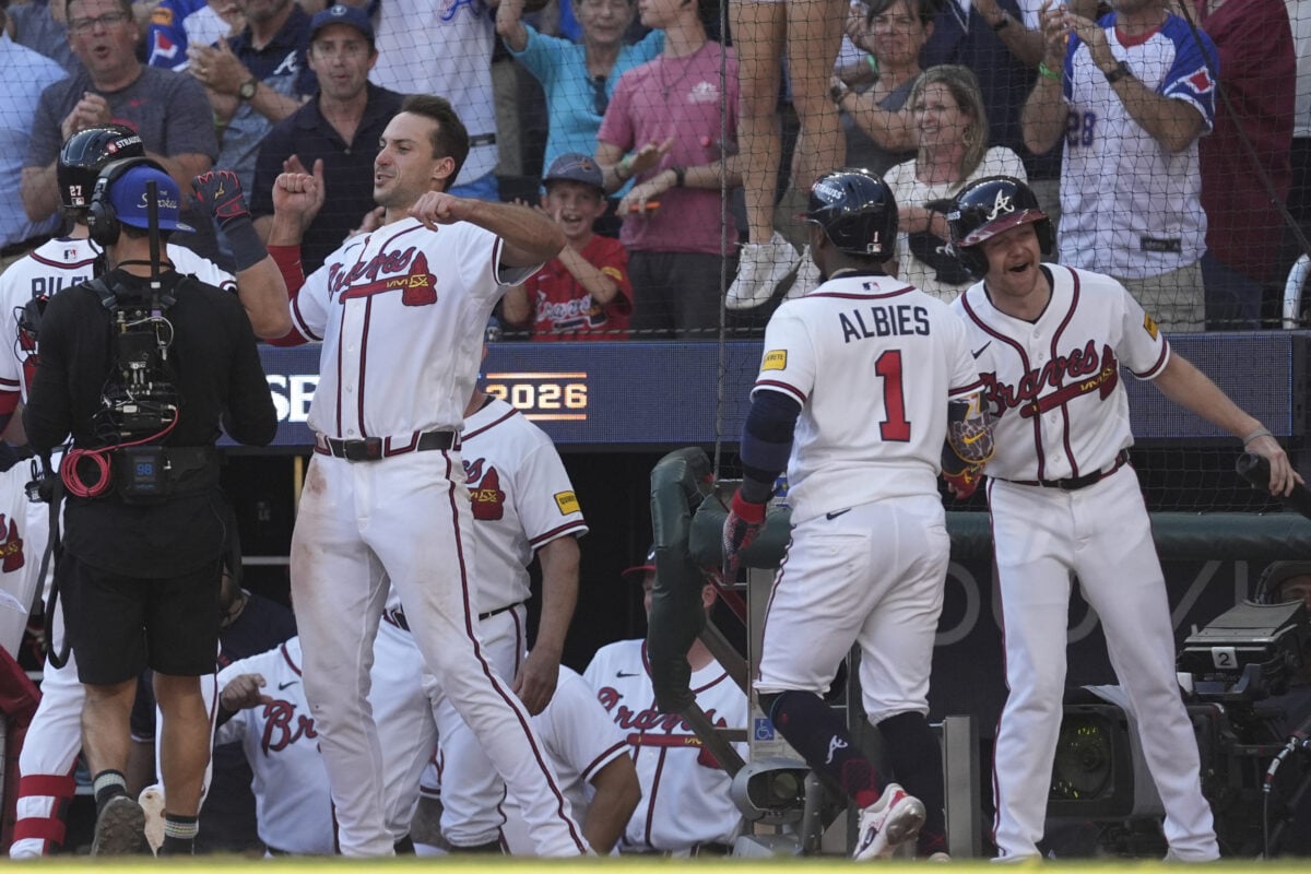 Sep 29, 2026; Cumberland, Georgia, USA;  Atlanta Braves third baseman Austin Riley (27) reacts after hitting a three run home run against the Philadelphia Phillies in the eighth inning during game one of the Wildcard round for the 2026 MLB Playoffs at Truist Park.  Mandatory Credit: Dale Zanine-Imagn Images