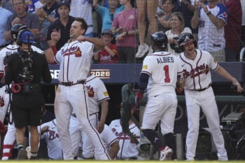 Sep 29, 2026; Cumberland, Georgia, USA;  Atlanta Braves third baseman Austin Riley (27) reacts after hitting a three run home run against the Philadelphia Phillies in the eighth inning during game one of the Wildcard round for the 2026 MLB Playoffs at Truist Park.  Mandatory Credit: Dale Zanine-Imagn Images