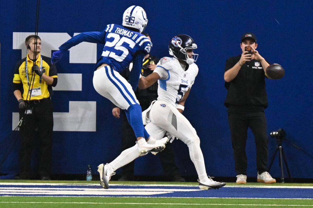 Oct 26, 2025; Indianapolis, Indiana, USA; Indianapolis Colts safety Rodney Thomas II (25) breaks up a pass intended for Tennessee Titans wide receiver Elic Ayomanor (5) during the fourth quarter at Lucas Oil Stadium. Mandatory Credit: Robert Goddin-Imagn Images