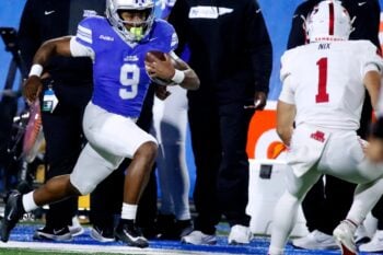 Middle Tennessee running back Jekail Middlebrook (9) carries the ball as Jacksonville State Gamecocks safety Caleb Nix (1) moves in for a tackle during the football game between Middle Tennessee and Jacksonville State, at MTSU on Wednesday, October 29, 2025.