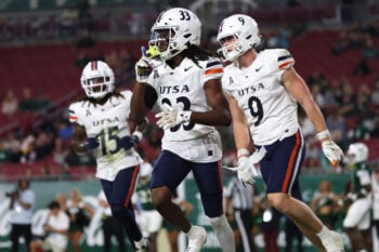 Nov 6, 2025; Tampa, Florida, USA; UTSA Roadrunners wide receiver Mekhi Anderson (33) celebrates after he ran the ball in for a touchdown against the South Florida Bulls  during the second half at Raymond James Stadium. Mandatory Credit: Kim Klement Neitzel-Imagn Images