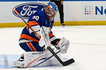 Dec 13, 2025; Elmont, New York, USA; New York Islanders goaltender Ilya Sorokin (30). makes a glove save against the Tampa Bay Lightning during during the third period at UBS Arena. Mandatory Credit: Dennis Schneidler-Imagn Images