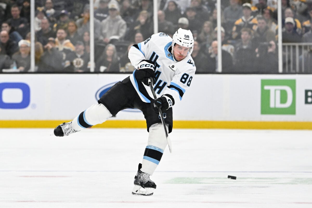 Dec 16, 2025; Boston, Massachusetts, USA; Utah Mammoth defenseman Nate Schmidt (88) fires the puck through the neutral zone during the second period against the Boston Bruins at TD Garden. Mandatory Credit: Eric Canha-Imagn Images