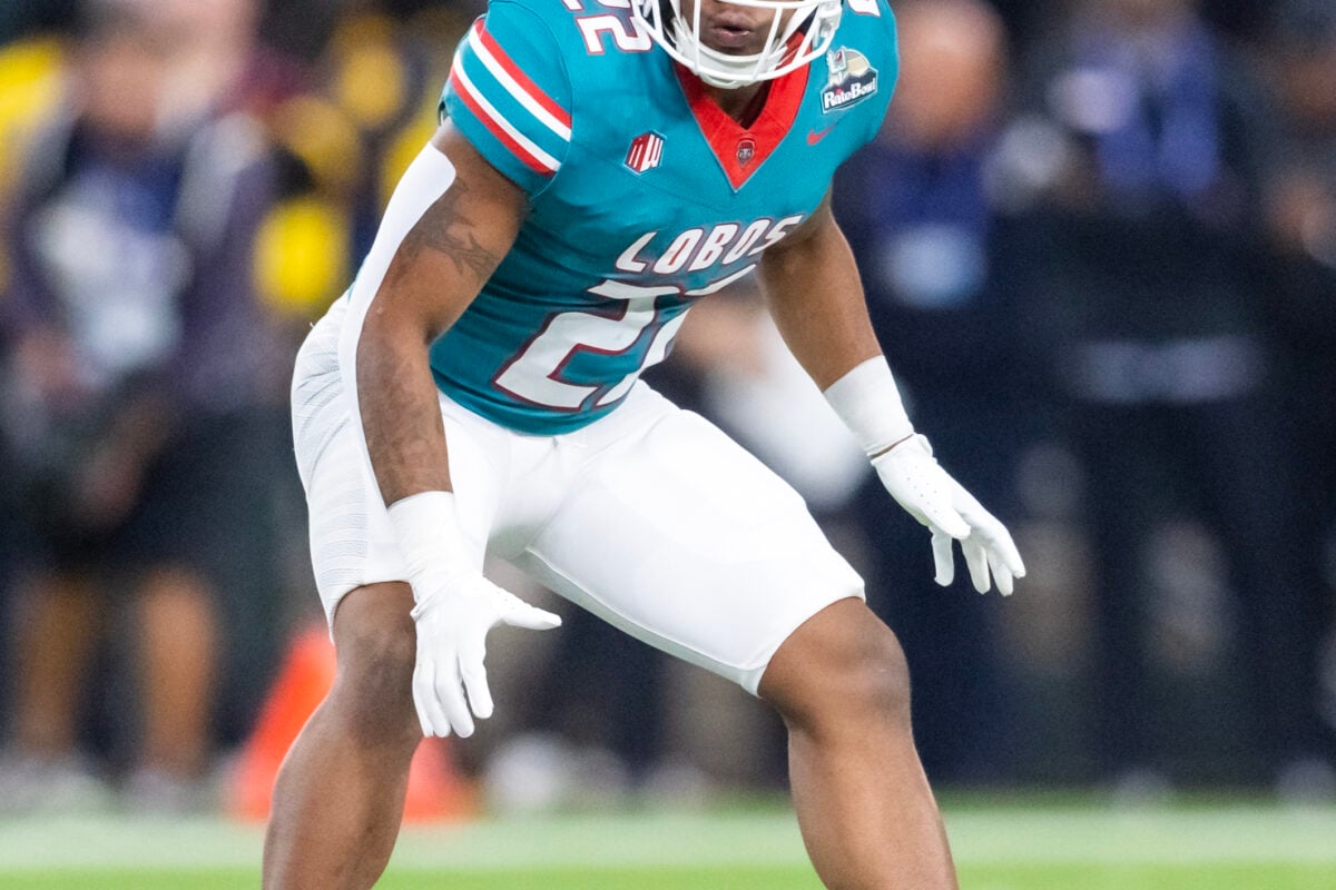 Dec 26, 2025; Phoenix, AZ, USA; New Mexico Lobos running back Scottre Humphrey (22) against the Minnesota Golden Gophers during the Rate Bowl at Chase Field. Mandatory Credit: Mark J. Rebilas-Imagn Images