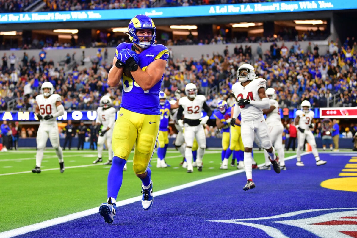 Jan 4, 2026; Inglewood, California, USA;  Los Angeles Rams tight end Colby Parkinson (84) scores a touchdown against the Arizona Cardinals during the second half at SoFi Stadium. Mandatory Credit: Gary A. Vasquez-Imagn Images