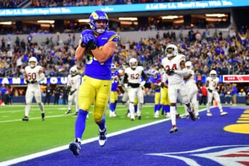 Jan 4, 2026; Inglewood, California, USA;  Los Angeles Rams tight end Colby Parkinson (84) scores a touchdown against the Arizona Cardinals during the second half at SoFi Stadium. Mandatory Credit: Gary A. Vasquez-Imagn Images