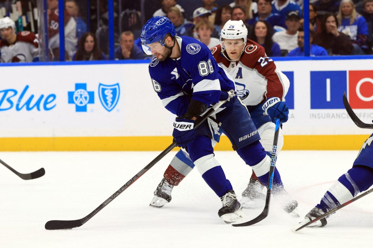 Jan 6, 2026; Tampa, Florida, USA; Colorado Avalanche center Nathan MacKinnon (29) defends Tampa Bay Lightning right wing Nikita Kucherov (86) during the third period at Benchmark International Arena. Mandatory Credit: Kim Klement Neitzel-Imagn Images