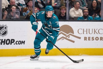 Jan 10, 2026; San Jose, California, USA; San Jose Sharks center Macklin Celebrini (71) plays the puck against the Dallas Stars during the second period at SAP Center at San Jose. Mandatory Credit: Robert Edwards-Imagn Images