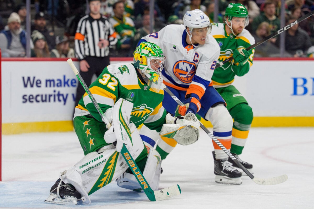 Jan 10, 2026; Saint Paul, Minnesota, USA; New York Islanders left wing Anders Lee (27) skates into Minnesota Wild goaltender Filip Gustavsson (32) in the third period at Grand Casino Arena. Mandatory Credit: Matt Blewett-Imagn Images