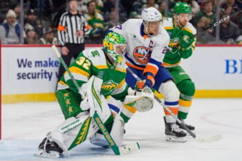 Jan 10, 2026; Saint Paul, Minnesota, USA; New York Islanders left wing Anders Lee (27) skates into Minnesota Wild goaltender Filip Gustavsson (32) in the third period at Grand Casino Arena. Mandatory Credit: Matt Blewett-Imagn Images