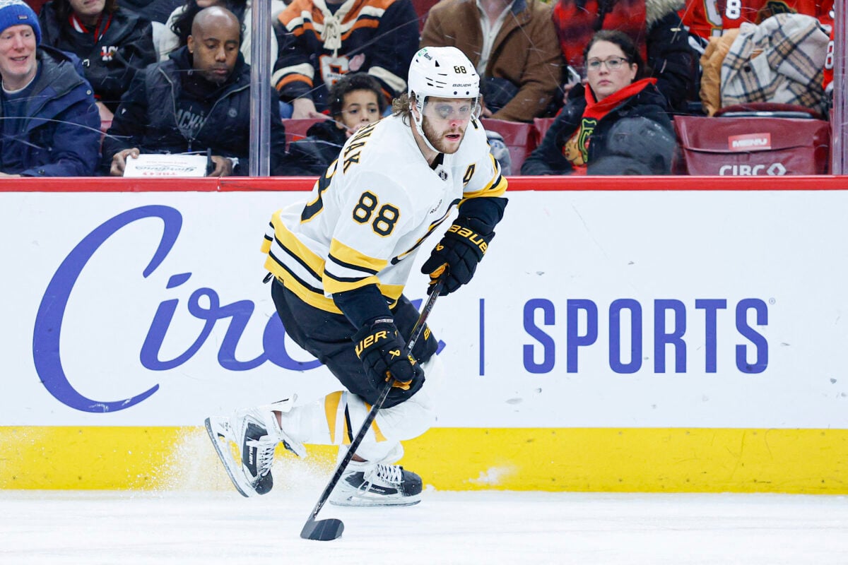 Jan 17, 2026; Chicago, Illinois, USA; Boston Bruins right wing David Pastrnak (88) looks to pass the puck against the Chicago Blackhawks during the first period at United Center. Mandatory Credit: Kamil Krzaczynski-Imagn Images