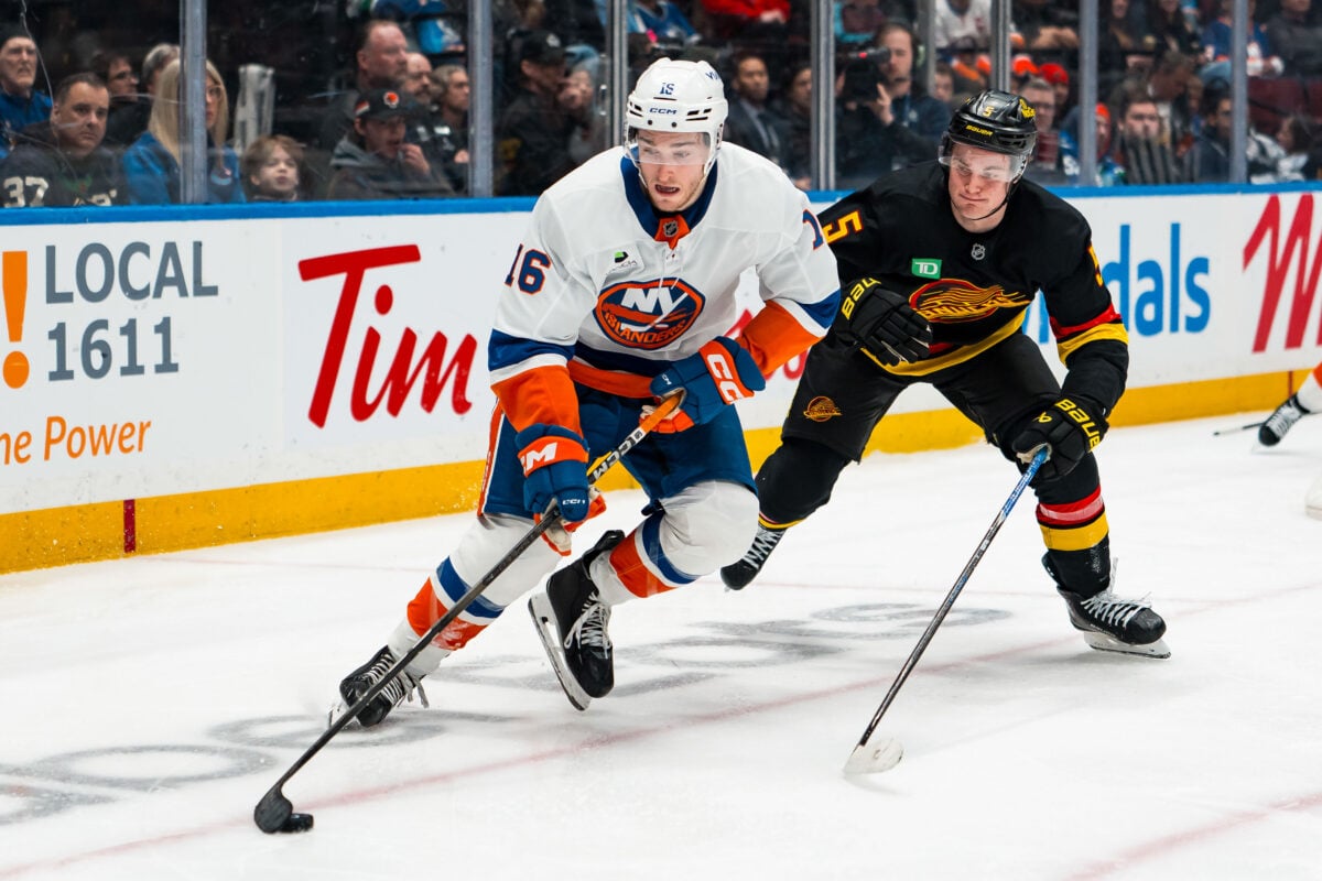 Jan 19, 2026; Vancouver, British Columbia, CAN; Vancouver Canucks defenseman Tom Willander (5) pursues New York Islanders forward Marc Gatcomb (16) in the third period at Rogers Arena. Mandatory Credit: Bob Frid-Imagn Images
