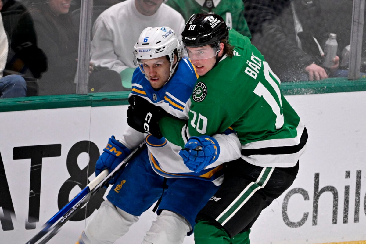 Feb 4, 2026; Dallas, Texas, USA; St. Louis Blues defenseman Philip Broberg (6) and Dallas Stars center Oskar Back (10) chase the puck during the third period at the American Airlines Center. Mandatory Credit: Jerome Miron-Imagn Images