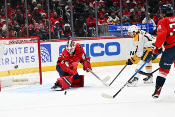Feb 5, 2026; Washington, District of Columbia, USA; Washington Capitals goaltender Logan Thompson (48) saves the shot by Nashville Predators center Tyson Jost (17) during the second period at Capital One Arena. Mandatory Credit: Brad Mills-Imagn Images