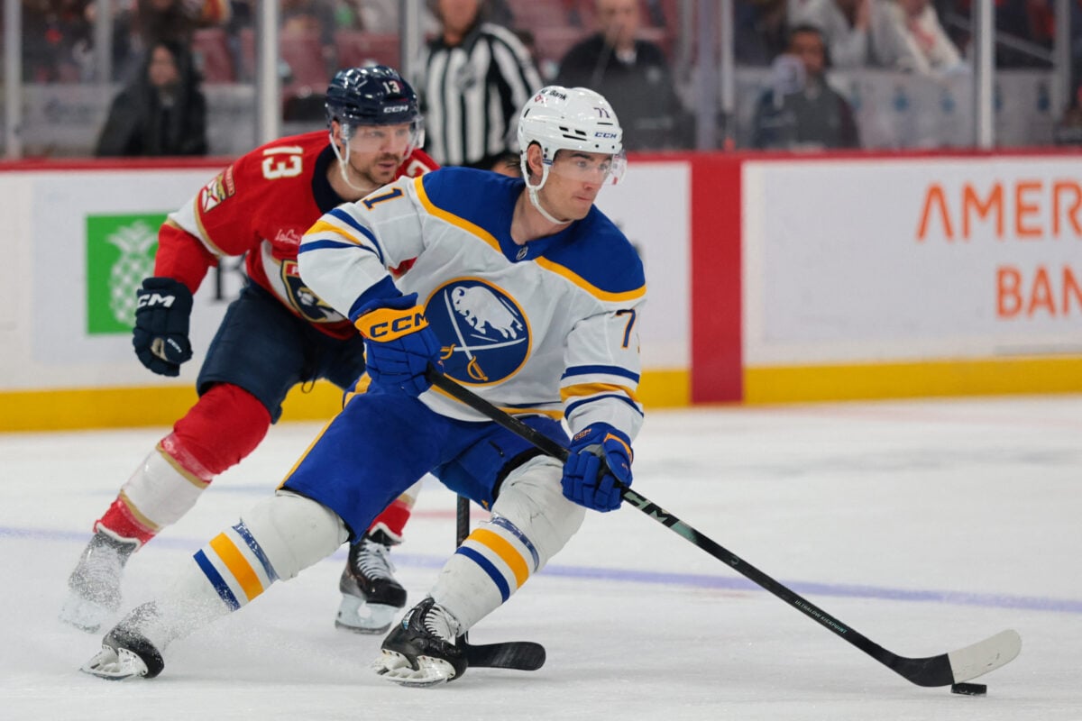 Feb 27, 2026; Sunrise, Florida, USA; Buffalo Sabres center Ryan McLeod (71) moves the puck against Florida Panthers center Sam Reinhart (13) during the first period at Amerant Bank Arena. Mandatory Credit: Sam Navarro-Imagn Images