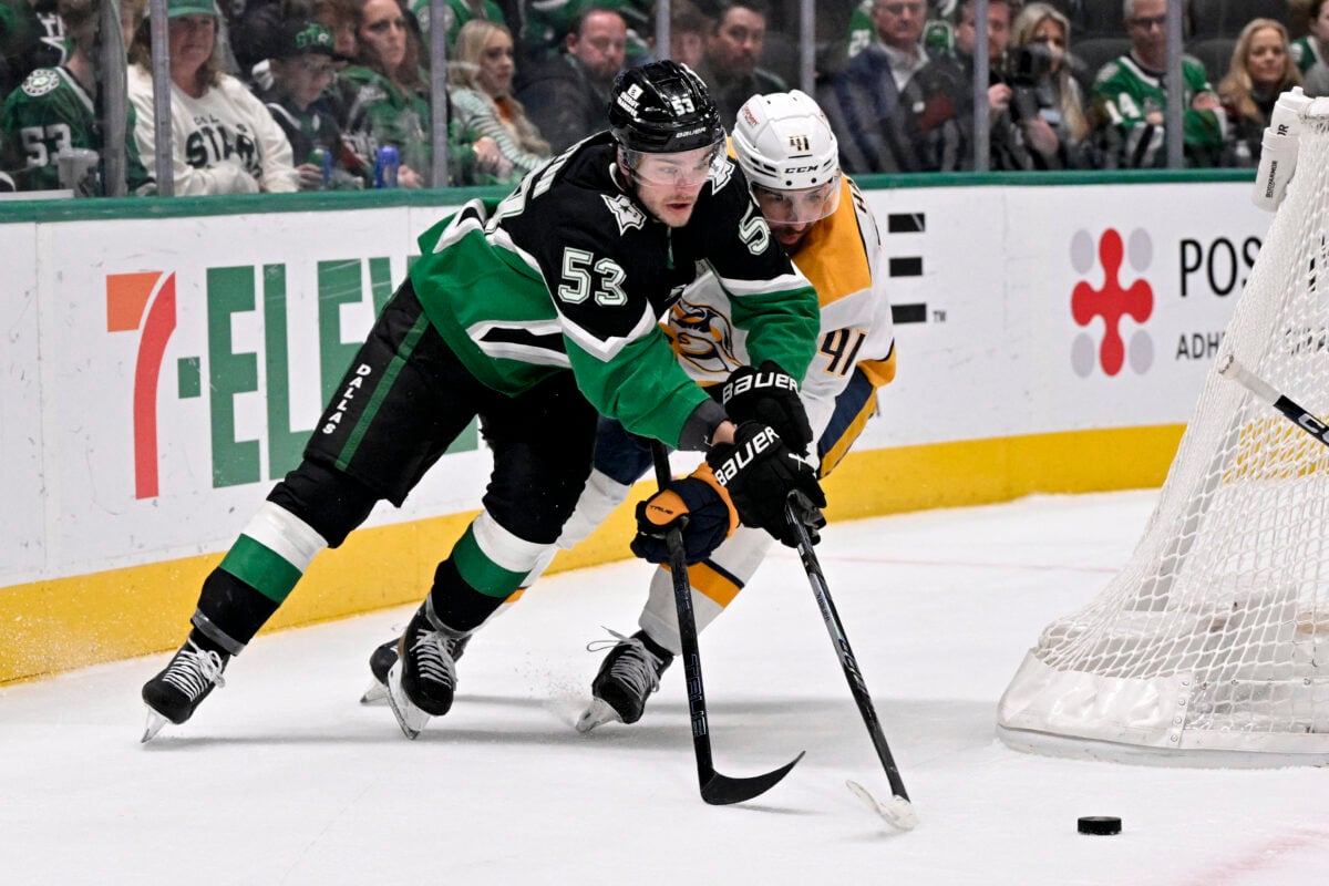 Feb 28, 2026; Dallas, Texas, USA; Dallas Stars center Wyatt Johnston (53) and Nashville Predators defenseman Nicolas Hague (41) chase the puck during the second period at the American Airlines Center. Mandatory Credit: Jerome Miron-Imagn Images