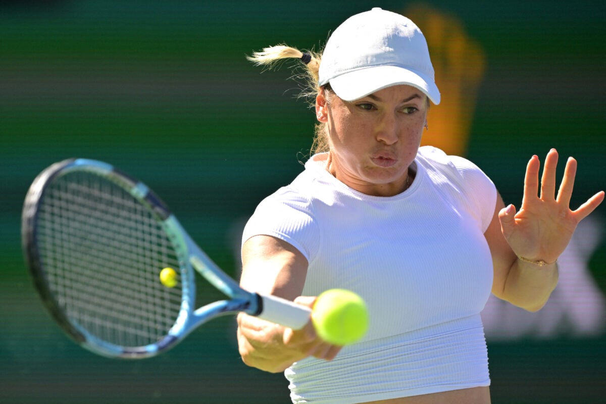 Mar 4, 2026; Indian Wells, CA, USA; Yulia Putintseva (KAZ) hits a shot against Paula Badosa (ESP) in her first round match during the BNP Paribas Open at the Indian Wells Tennis Garden. Mandatory Credit: Jayne Kamin-Oncea-Imagn Images