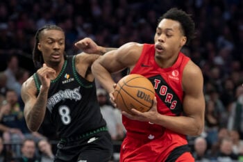 Mar 5, 2026; Minneapolis, Minnesota, USA; Toronto Raptors forward Scottie Barnes (4) drives to the basket past Minnesota Timberwolves guard Bones Hyland (8) in the second half at Target Center. Mandatory Credit: Jesse Johnson-Imagn Images