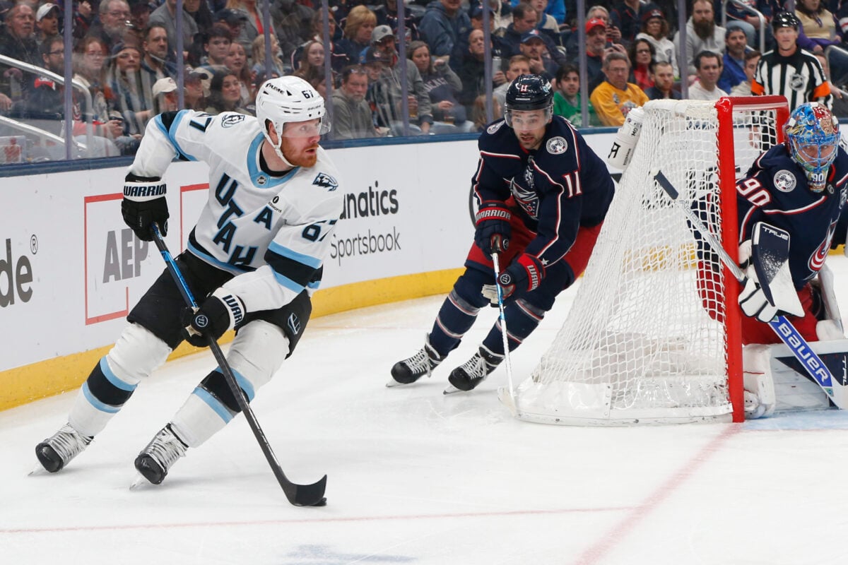 Mar 7, 2026; Columbus, Ohio, USA; Utah Mammoth left wing Lawson Crouse (67) looks to pass as Columbus Blue Jackets left wing Miles Wood (11) trails the play during the first period at Nationwide Arena. Mandatory Credit: Russell LaBounty-Imagn Images