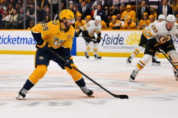 Mar 5, 2026; Nashville, Tennessee, USA;  Nashville Predators defenseman Roman Josi (59) skates with the puck against the Boston Bruins during the first period at Bridgestone Arena. Mandatory Credit: Steve Roberts-Imagn Images