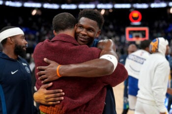 Mar 13, 2026; San Francisco, California, USA; Minnesota Timberwolves guard Anthony Edwards (5) hugs Golden State Warriors guard Stephen Curry (30) after the game at the Chase Center. Mandatory Credit: Cary Edmondson-Imagn Images