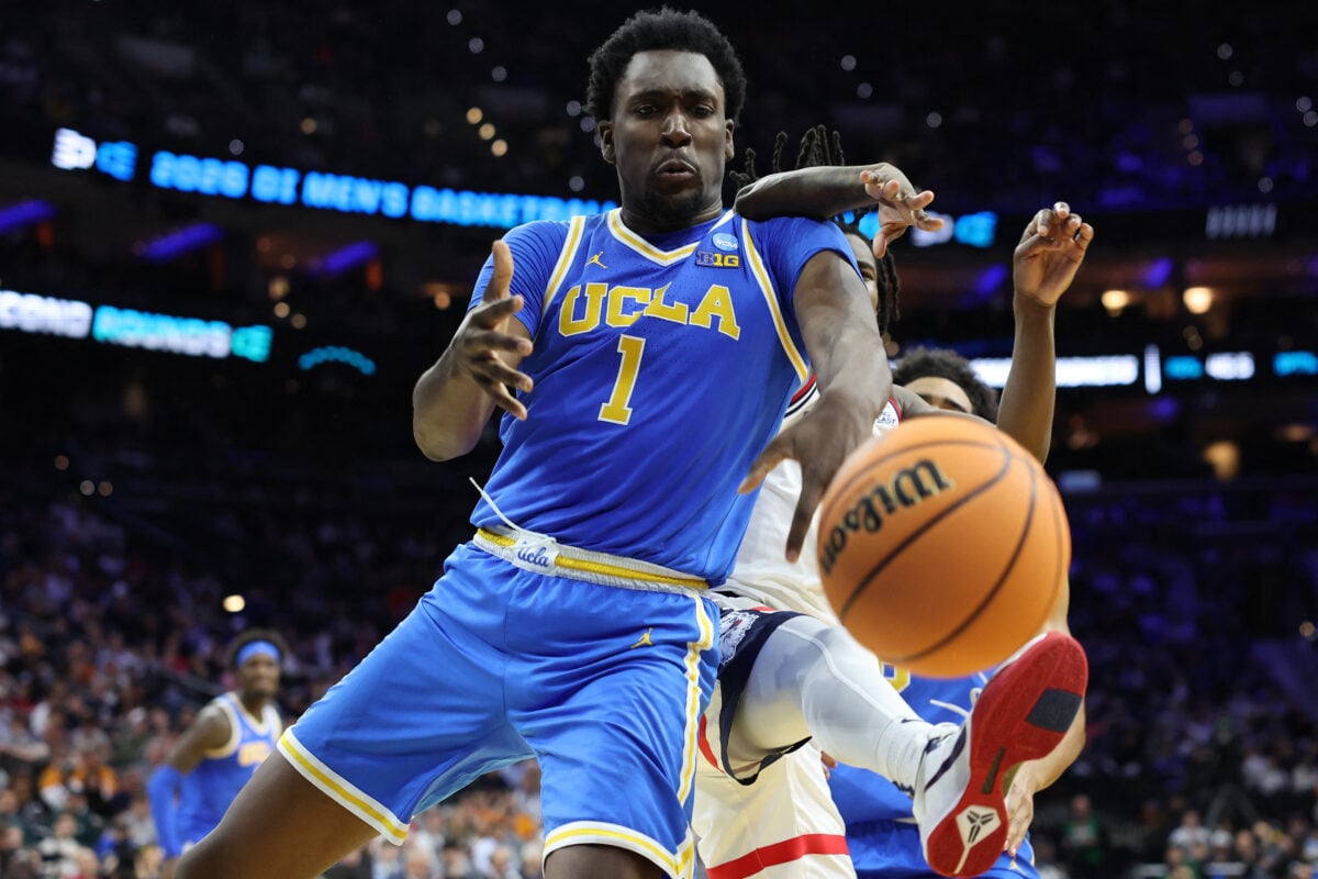 Mar 22, 2026; Philadelphia, PA, USA; UCLA Bruins center Xavier Booker (1) attempts to get a rebound against the UConn Huskies in the second half during a second round game of the men's 2026 NCAA Tournament at Xfinity Mobile Arena. Mandatory Credit: Bill Streicher-Imagn Images