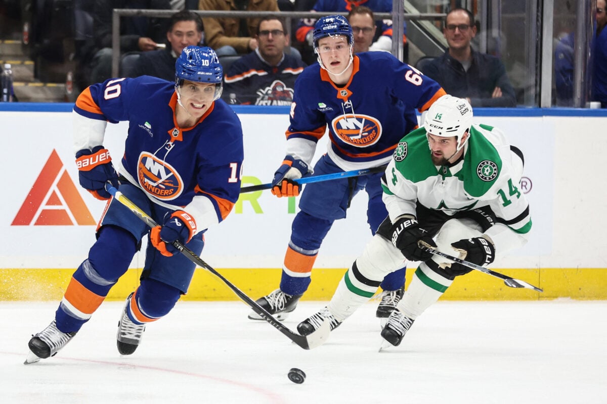 Mar 26, 2026; Elmont, New York, USA; New York Islanders center Brayden Schenn (10) and Dallas Stars left wing Jamie Benn (14) chase the puck in the second period at UBS Arena. Mandatory Credit: Wendell Cruz-Imagn Images
