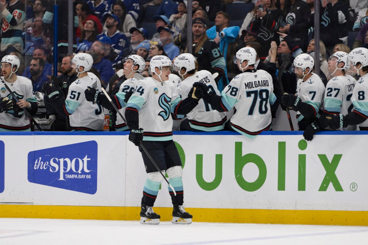 Mar 26, 2026; Tampa, Florida, USA; Seattle Kraken team reacts during a game against Tampa Bay Lightning at Benchmark International Arena. Mandatory Credit: Pablo Robles-Imagn Images