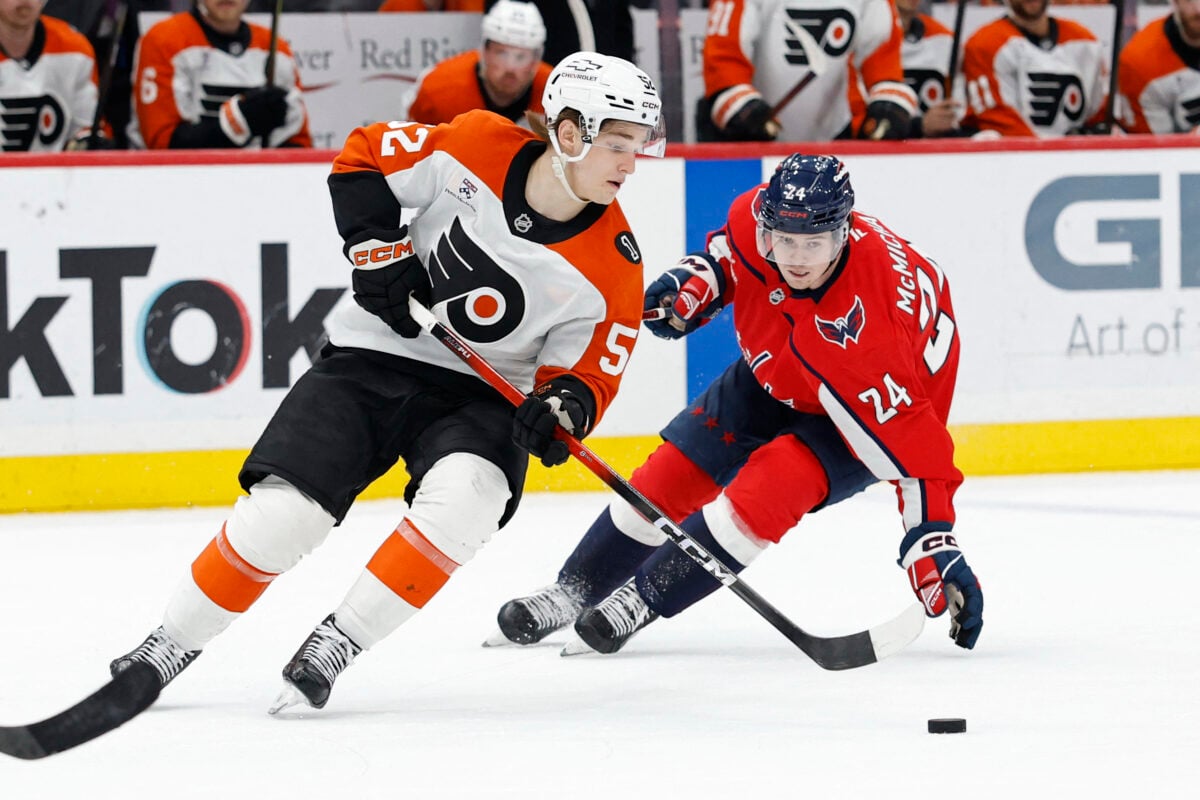 Mar 31, 2026; Washington, District of Columbia, USA; Philadelphia Flyers center Denver Barkey (52) skates with the puck as Washington Capitals left wing Connor McMichael (24) chases during the third period at Capital One Arena. Mandatory Credit: Geoff Burke-Imagn Images